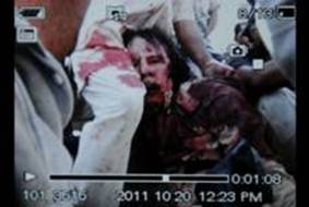 gaddafi-photos-news-life-dead-killed-shot-1-20111020.jpg